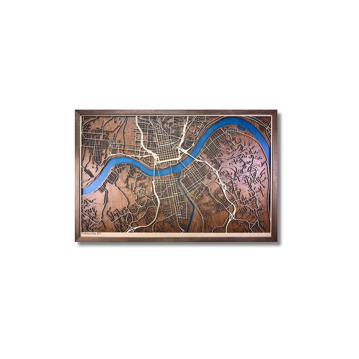 Framed wooden map of Covington, KY on a white background.