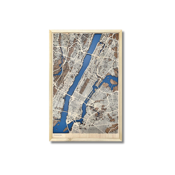 Custom map of Manhattan with blue water stain and raised roads in a natural colored frame.