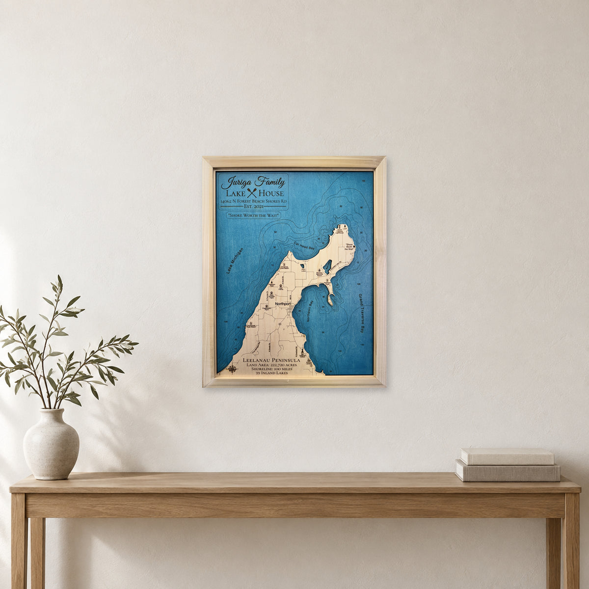 Leelanau Juriga wood map — single layer with engraved contours, staged room mockup