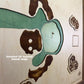 Close up image of a detailed hole-in-one wooden golf map. 