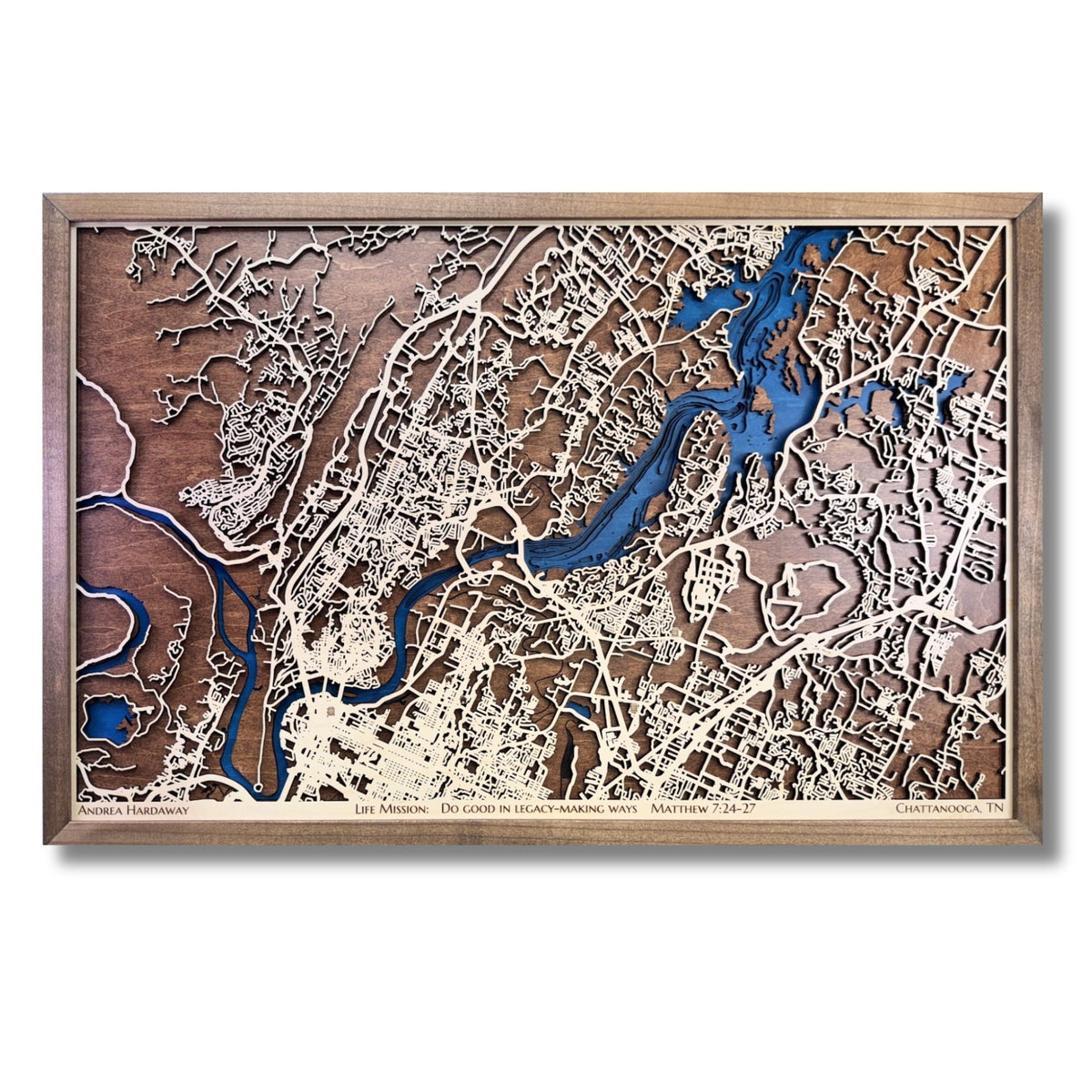 Framed wooden map of Chattanooga, TN with blue water stain, raised roads, and personalized text. 