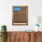 Wooden map of Cleveland, Ohio hanging on a wall above a console. 