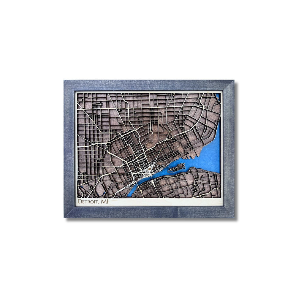 Small framed wooden map of Detroit, Michigan on a white background. 