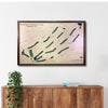 A large golf course map hanging on a wall above a wooden console. 