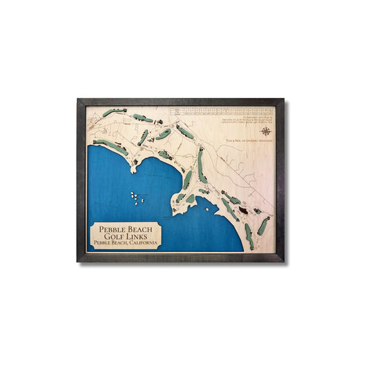 Framed 3D wooden map of Pebble Beach Golf Links in California on a white background. 