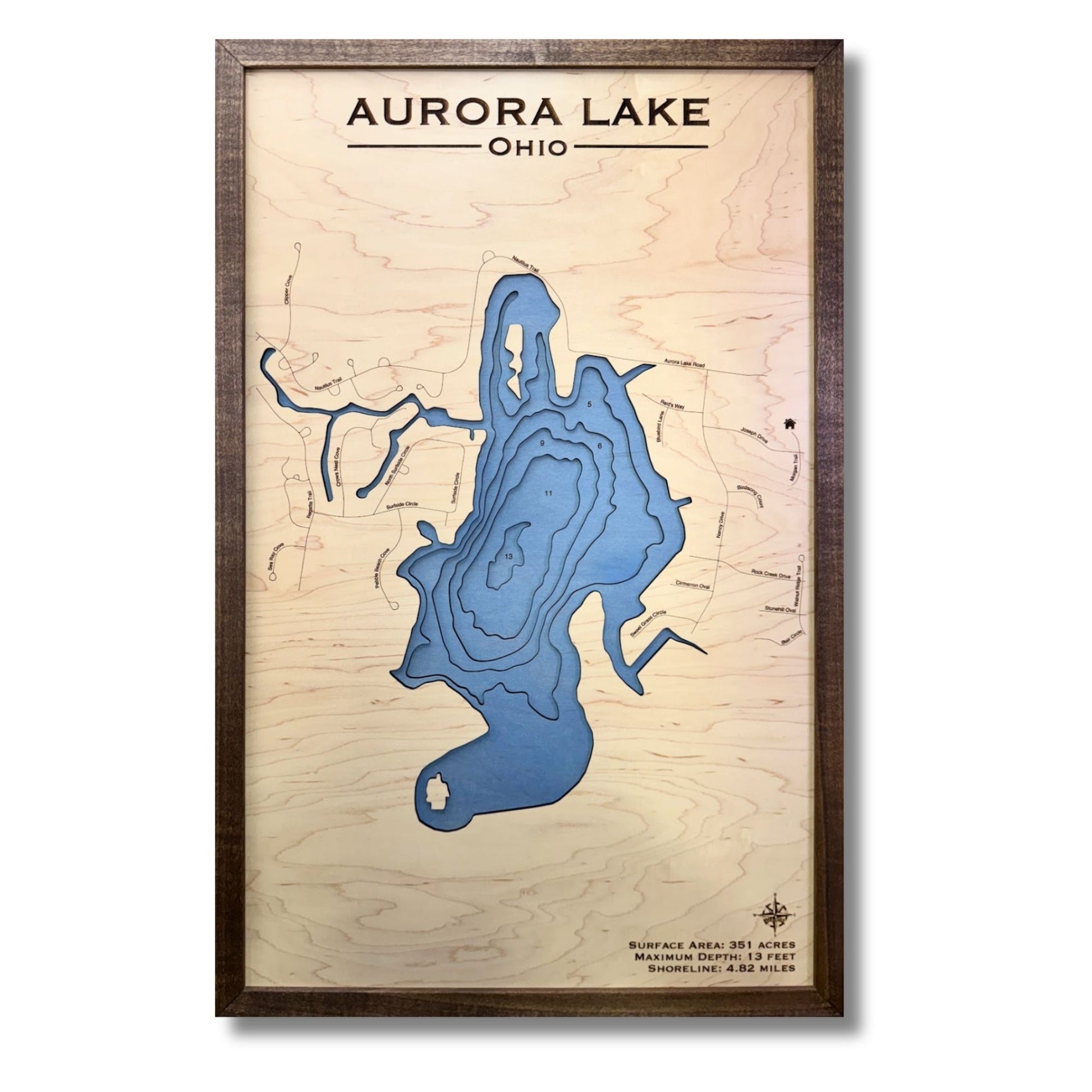 Wooden multilayer map of Aurora Lake, Ohio with light blue water stain and brown frame.