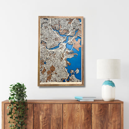 3D map of Boston, MA, hanging on a wall above a console. 