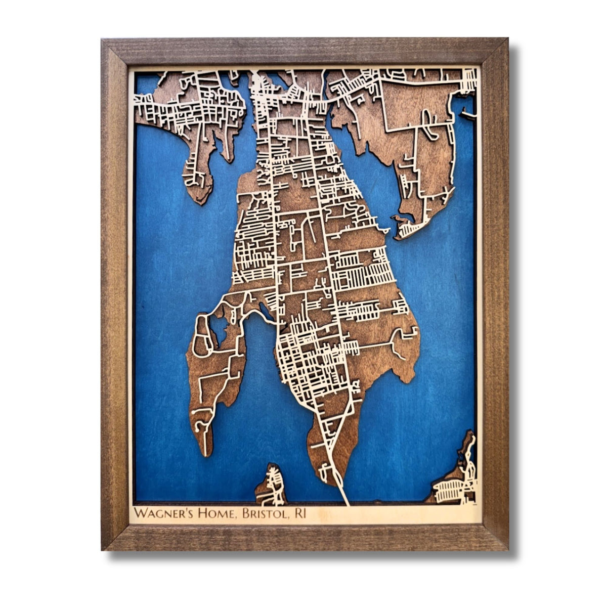 Wooden map of Bristol, RI with raised roads, blue water stain, and personalized text.