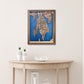 Framed wooden map of Bristol, RI hanging on wall above a wooden table with decorative items. 