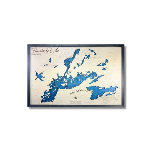 Wooden map of Burntside Lake, Minnesota, with blue stained water and a black frame. 