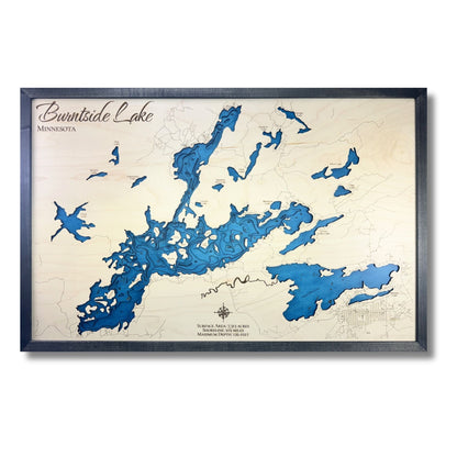 Multi water layer wooden map of Burntside Lake with a black frame and a white background. 