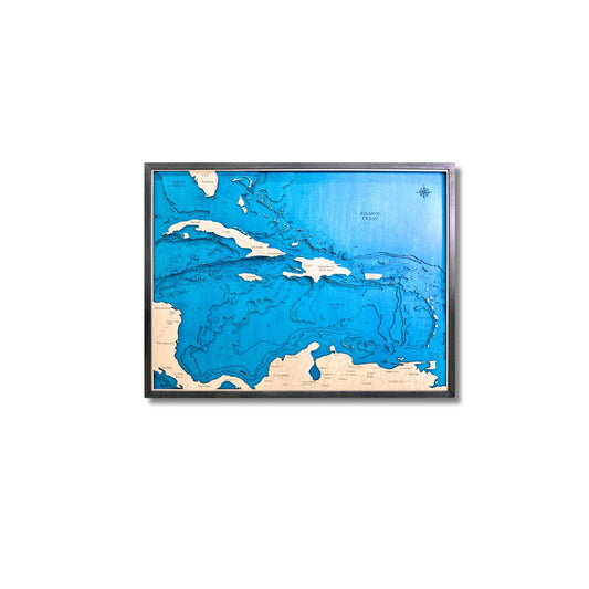 Large wooden map of the Caribbean in a wooden frame on a white background.