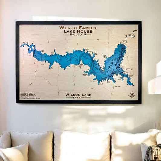 Hanging framed custom map of Wilson Lake with multi cut water layers, blue stain, and a personalized title. 