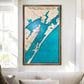 Large custom coastal map of Holiday Beach hanging on the wall above a couch. 
