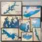 Examples of custom wooden lake maps with different design styles. 