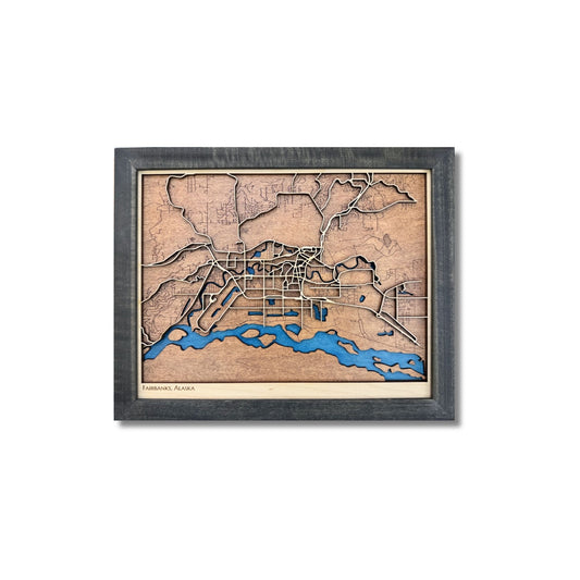 Small framed map of Fairbanks, Alaska on a white background. 
