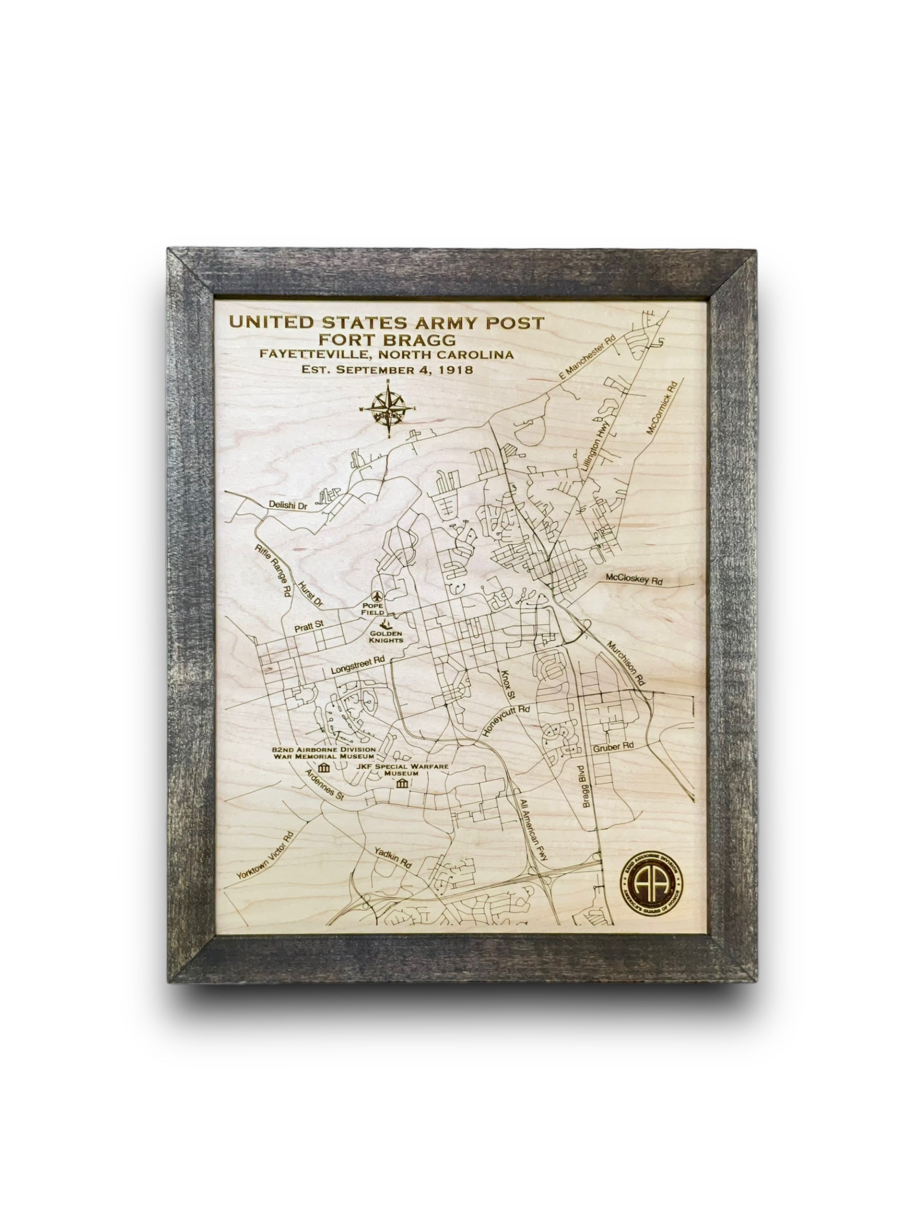 Small custom wood military map of Fort Bragg on a plain white background.