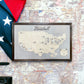 Wooden major league baseball stadium travel map with map and American flag in the background. 