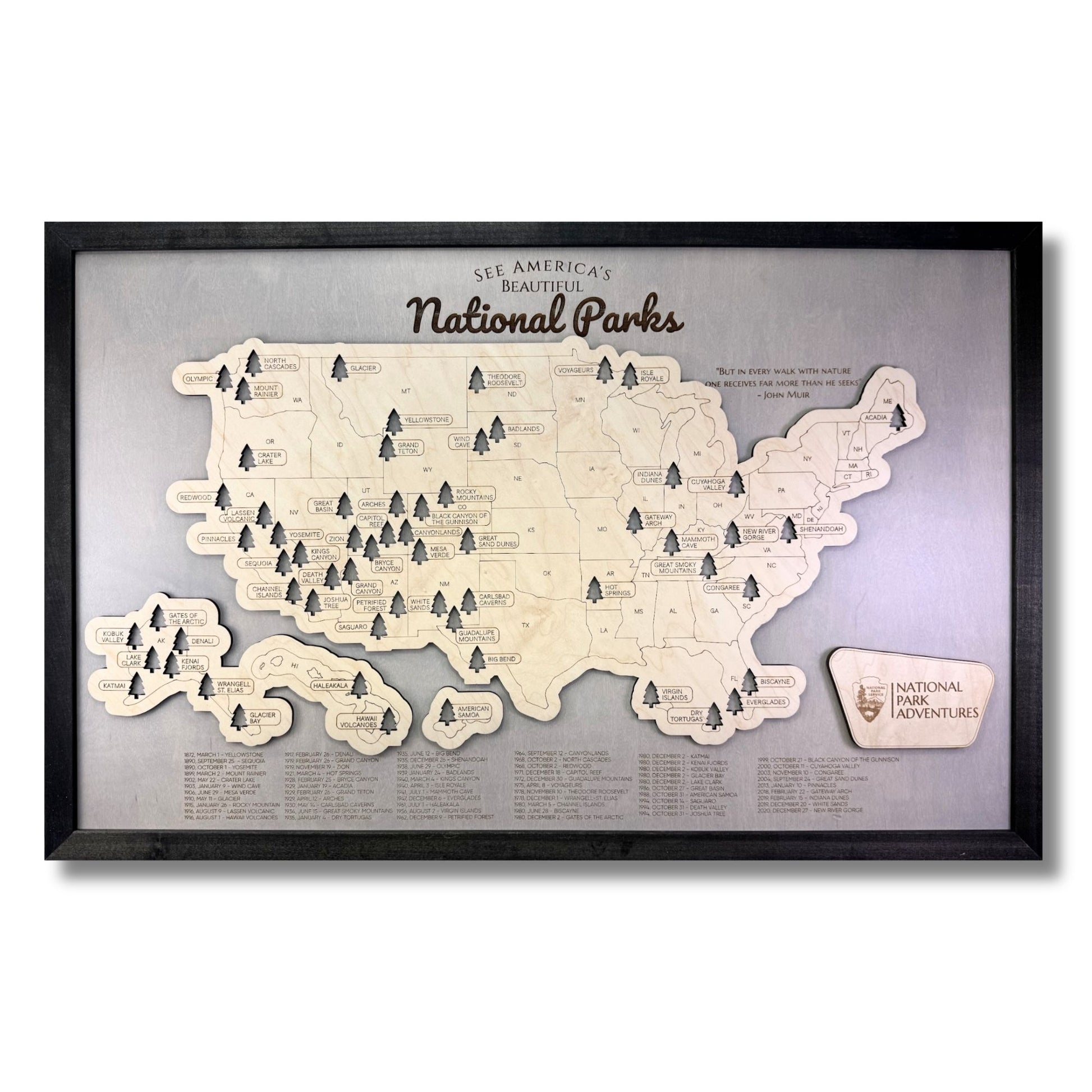 Wooden map of National Parks in the United States with a black frame and tree markers to track your travels.