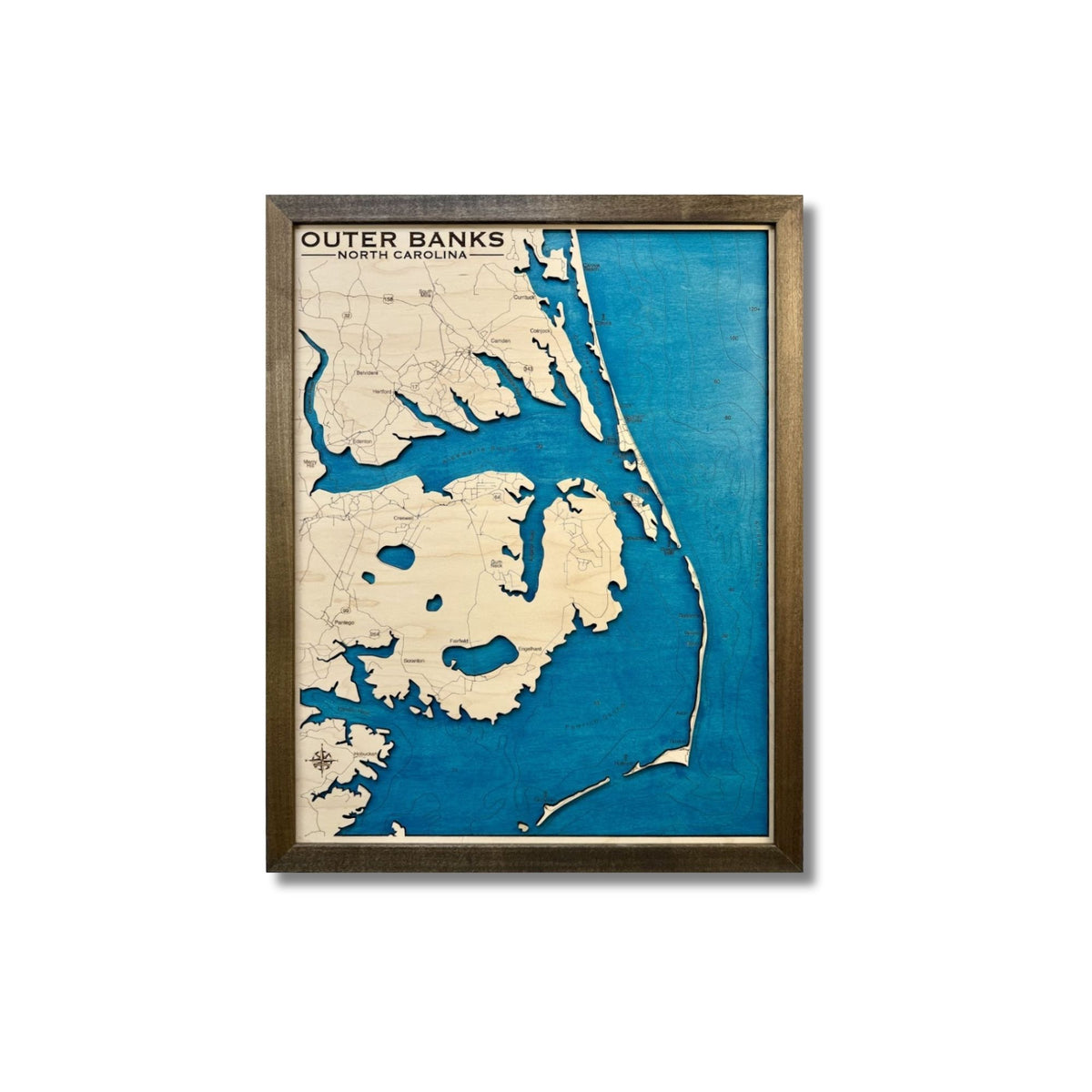 Engraved water layer map of the Outer Banks in North Carolina with a walnut brown frame. 