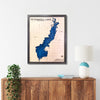 Petenwell Lake multi water layer map hanging on a wall above a console.