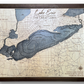 A 3D wooden map of Lake Erie with charcoal water stain color. 