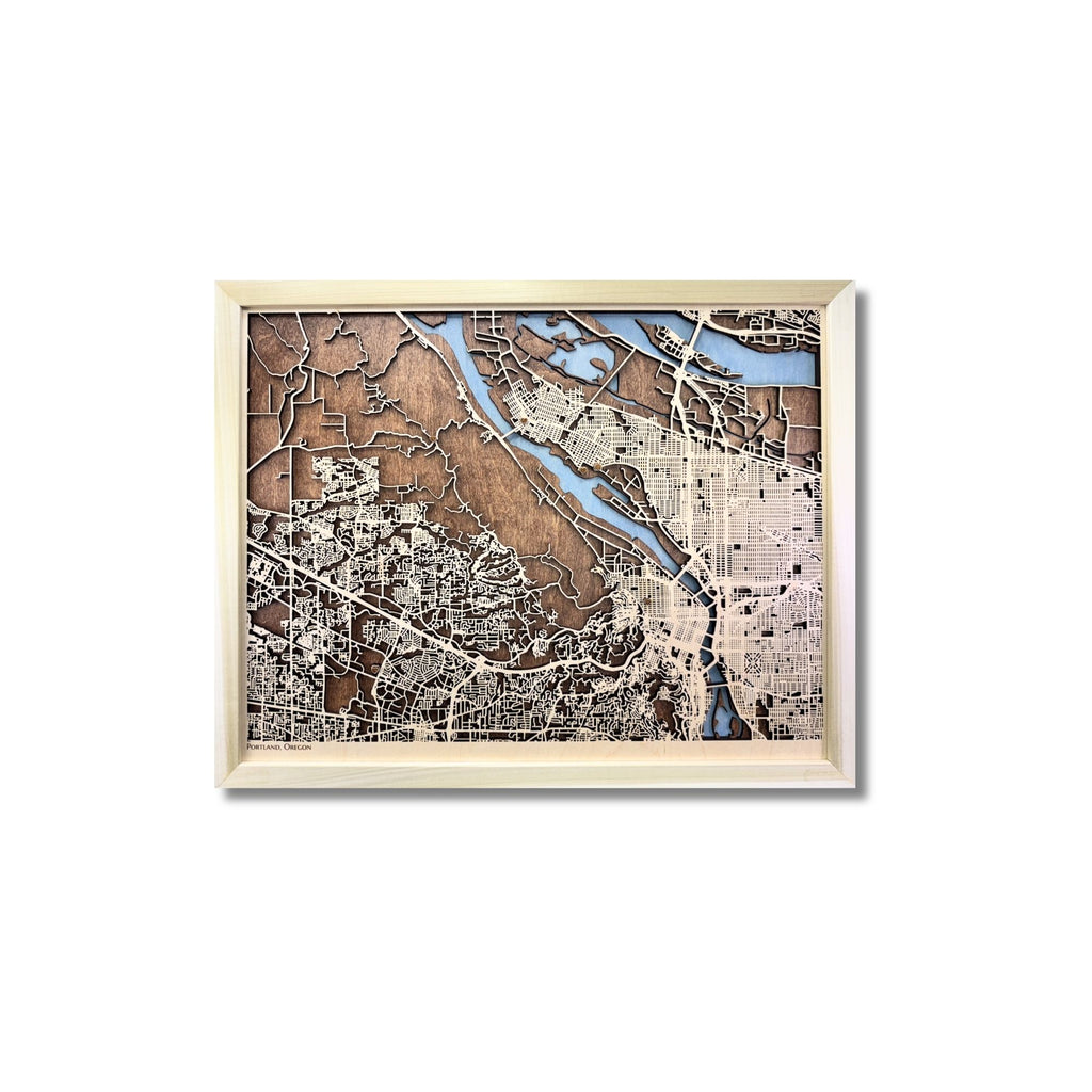 City map of Portland, Oregon, with beige raised roads, light blue water stain, and a natural wood color frame. 