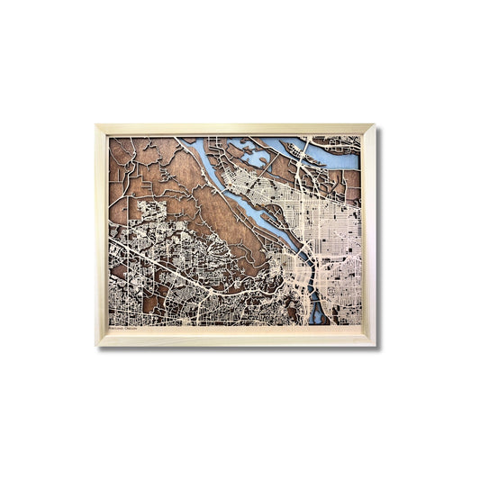 City map of Portland, Oregon, with beige raised roads, light blue water stain, and a natural wood color frame. 
