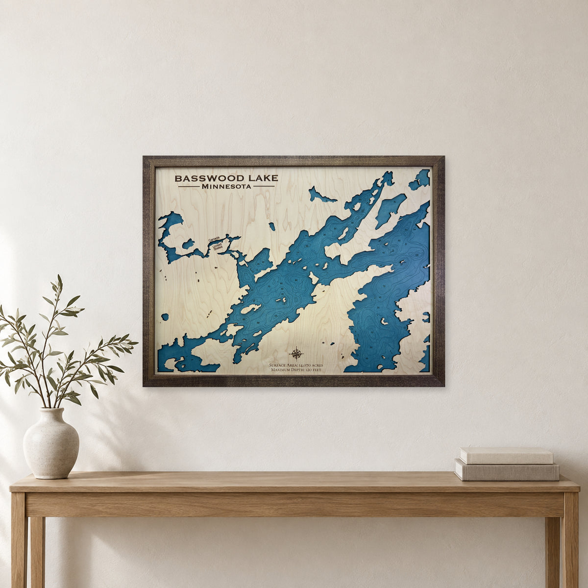 Basswood Groom wood map — single layer with engraved contours, staged room mockup