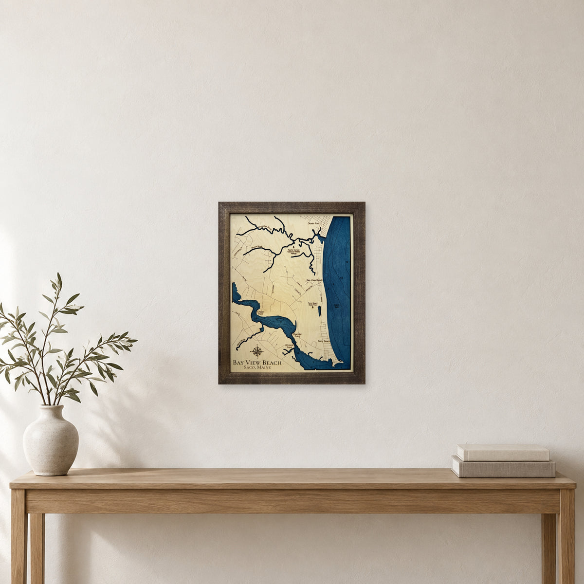 Bay View Beach wood map — single layer with engraved contours, staged room mockup