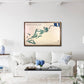 Living room with a framed map of Big Foot Country Club on the wall above a white sofa.