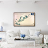 Living room with a framed map of Big Foot Country Club on the wall above a white sofa.