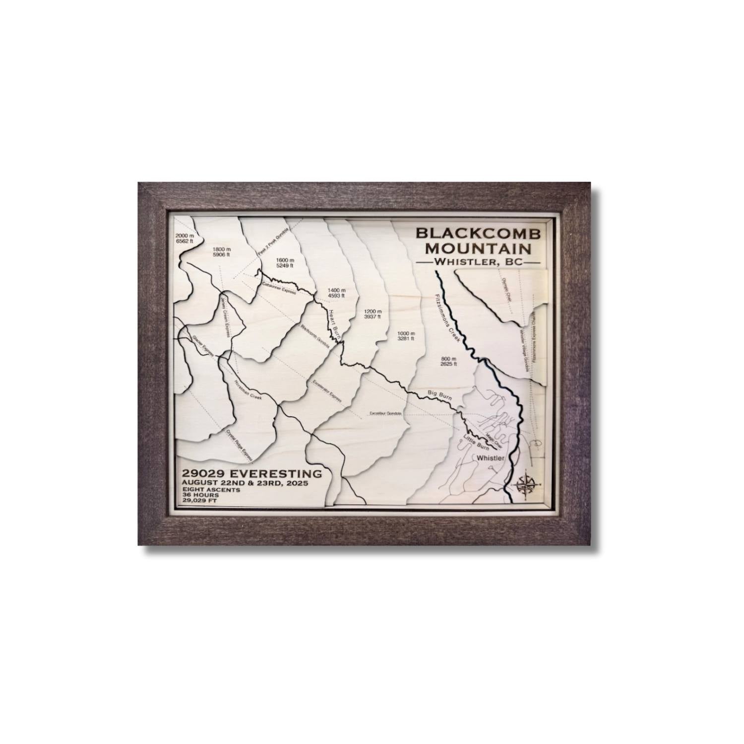 Framed 3D wooden topographic map of Blackcomb Mountain in Whistler, BC on a white background.