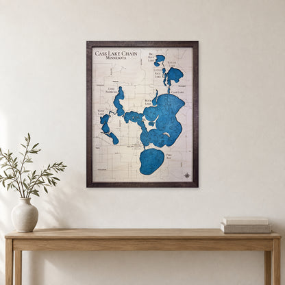 Cass Chain Walnut wood map — single layer with engraved contours, staged room mockup