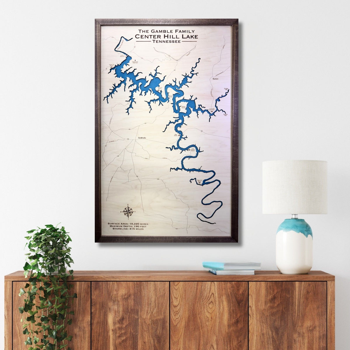 Center Hill Lake map hanging on a wall above a console. 