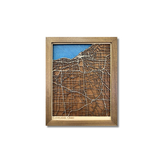 Wooden 3D map of Cleveland, Ohio with blue water stain and raised roads. 