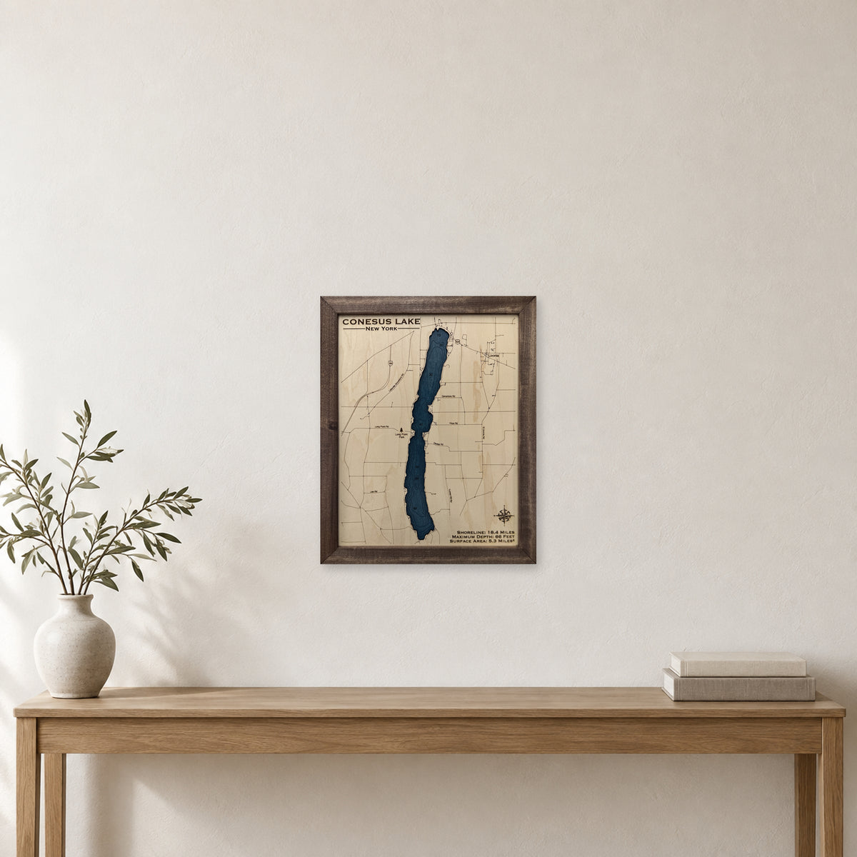 Conesus Walnut wood map — single layer with engraved contours, staged room mockup
