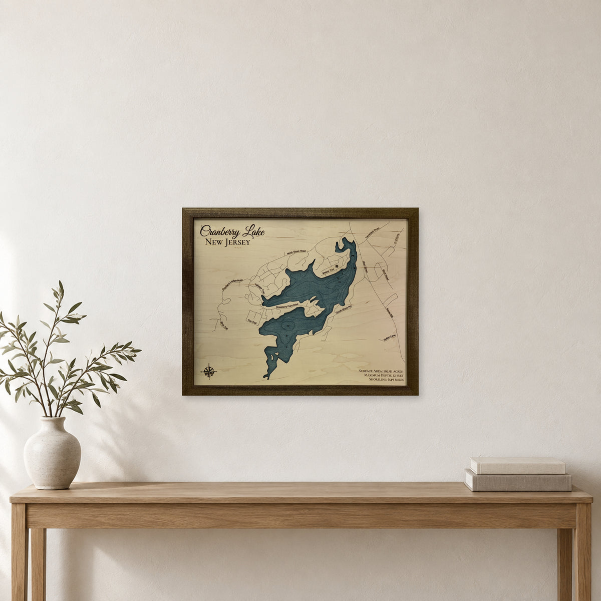 Cranberry Buckley wood map — single layer with engraved contours, staged room mockup