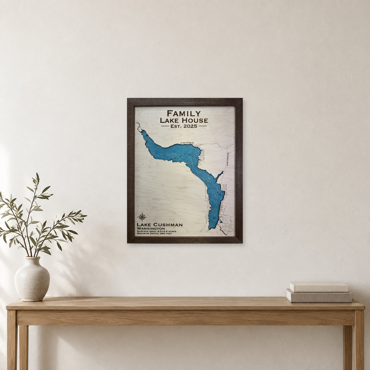 Cushman Family wood map — single layer with engraved contours, staged room mockup