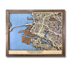 Custom city map showing light blue water stain, walnut brown frame, and personalized text. 