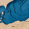 Close up image of the cut layers in the Lake Erie wooden map. 