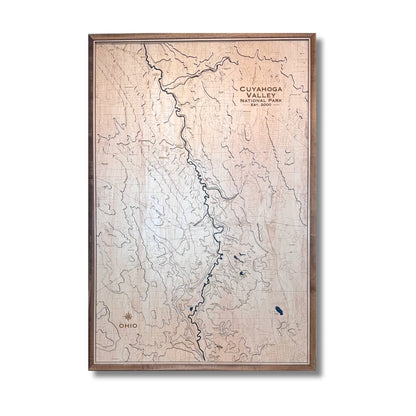 3D Topographic map of Cuyahoga Valley National Park with a wooden frame on a white background.