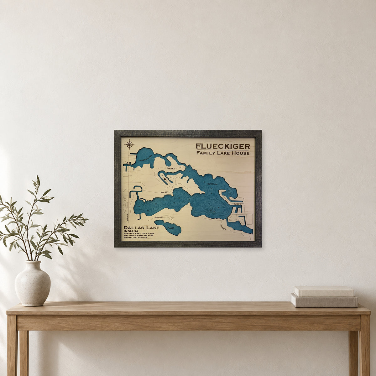 Dallas Flueckiger wood map — single layer with engraved contours, staged room mockup