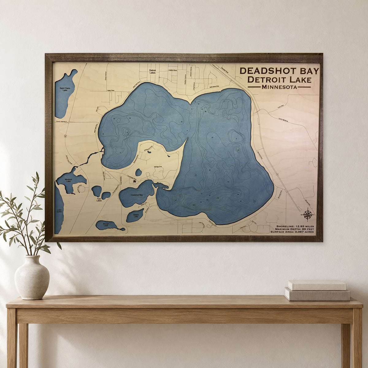 Deadshot Bay wood map — single layer with engraved contours, staged room mockup