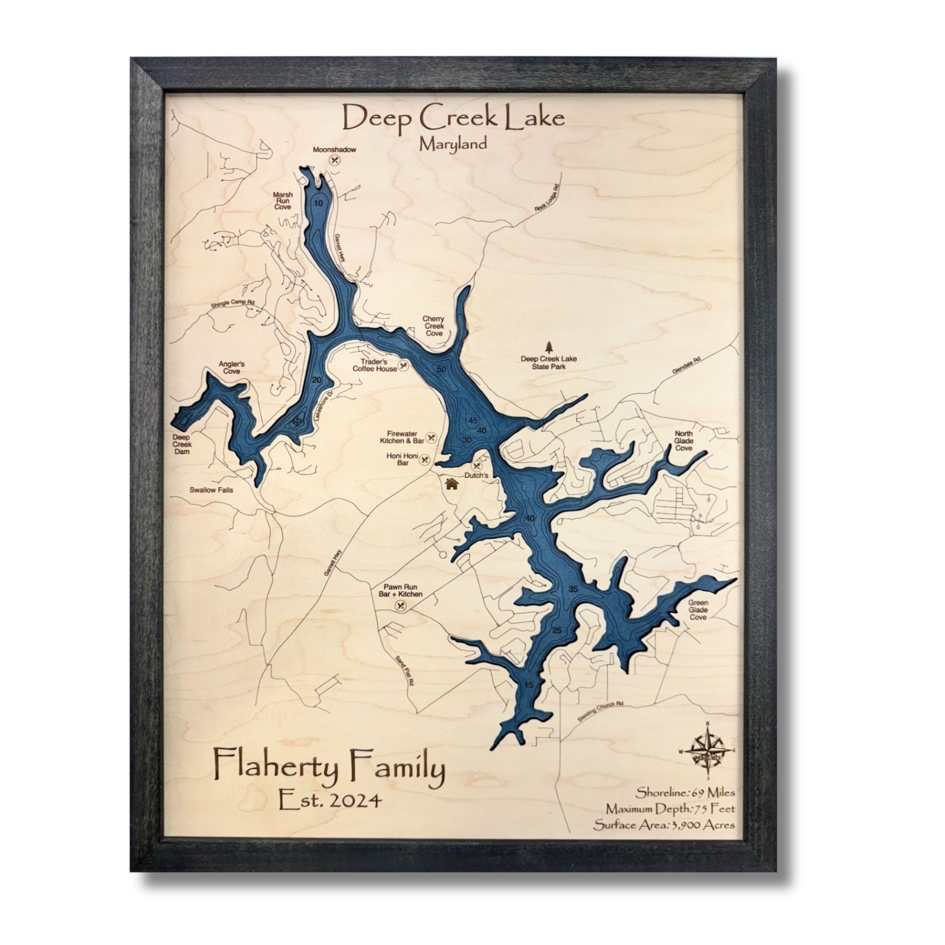 Framed map of Deep Creek Lake, Maryland with a black frame and engraved water layers.