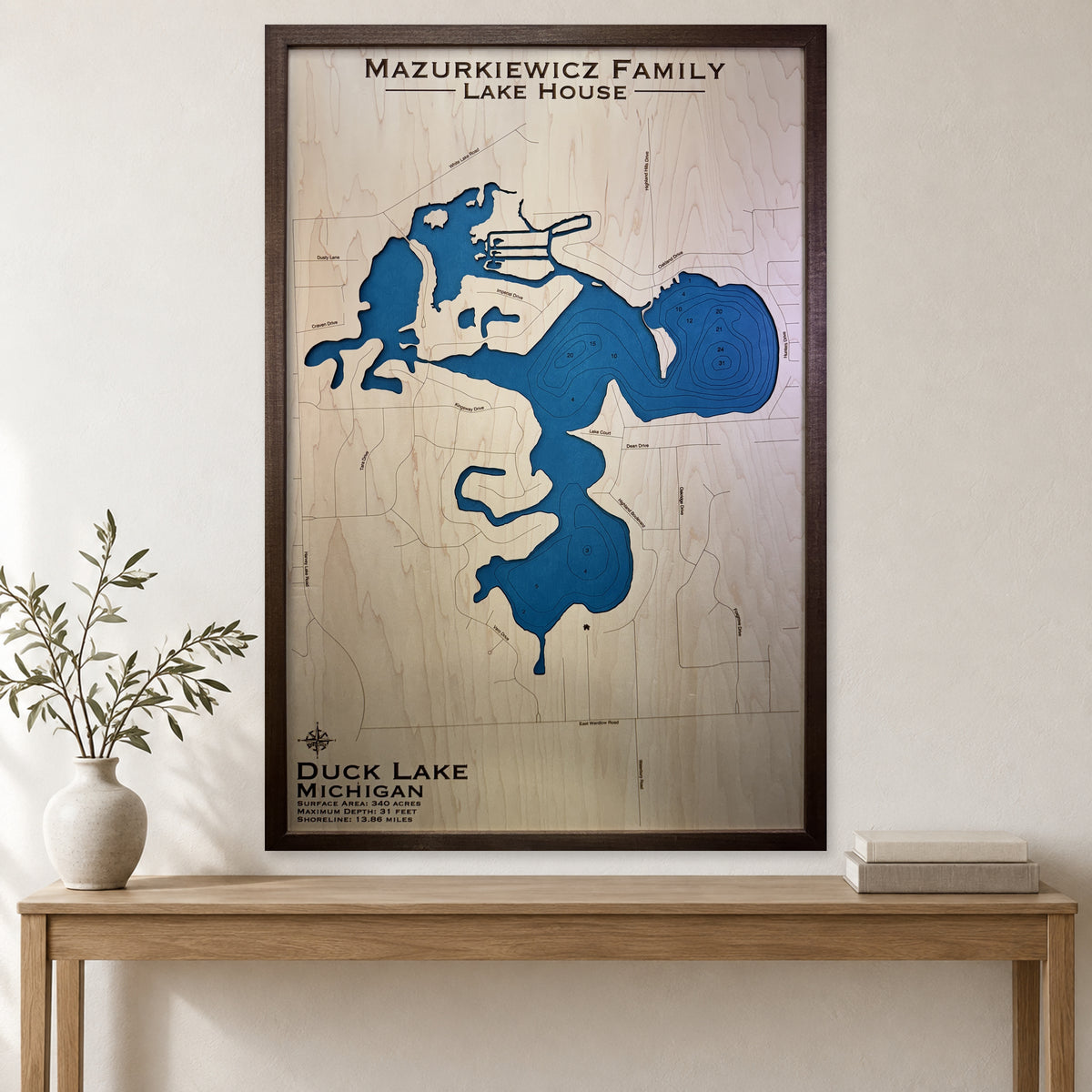Duck Mazurkiewicz wood map — single layer with engraved contours, staged room mockup
