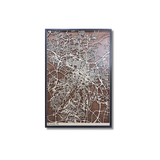 3D wooden city map of Durham, NC on a white background. 