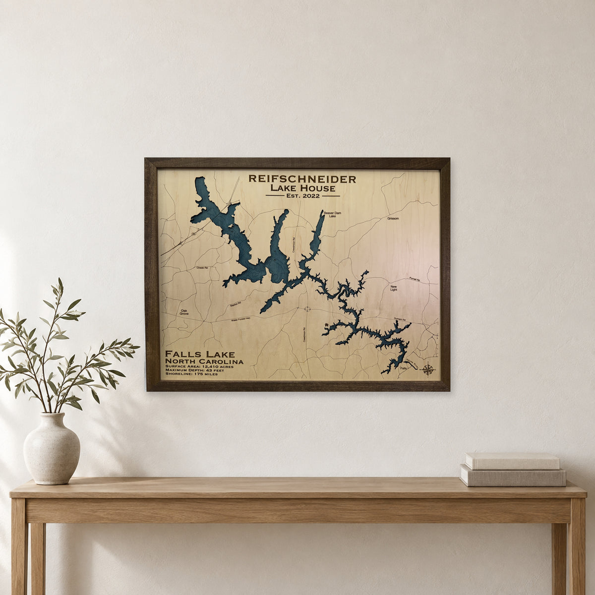 Falls Reifschneider wood map — single layer with engraved contours, staged room mockup