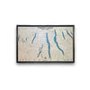 Wooden multilayer map of the Finger Lakes in New York on a white background. 