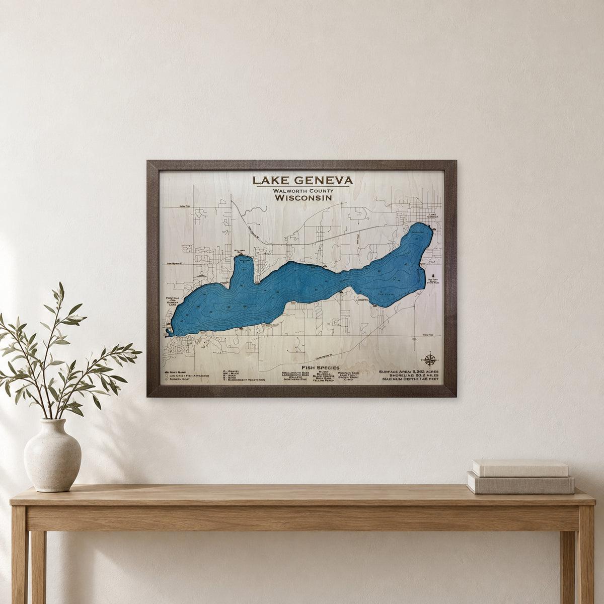 Geneva Thiede wood map — single layer with engraved contours, staged room mockup